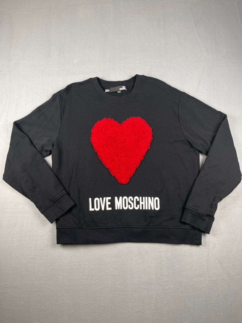 Love Moschino Black Sweatshirt with Red Heart Appliqué
Size: 12